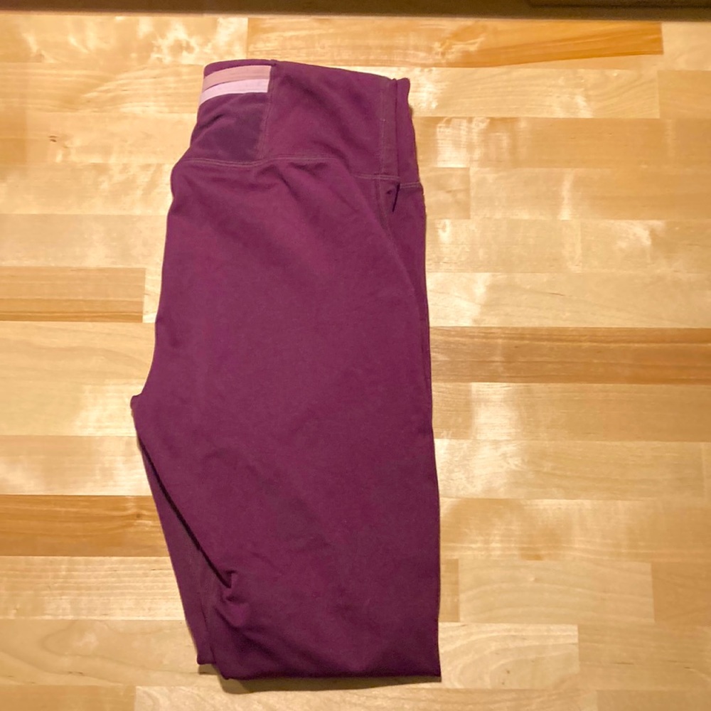 Magenta/Burgandy colored fabletic leggings